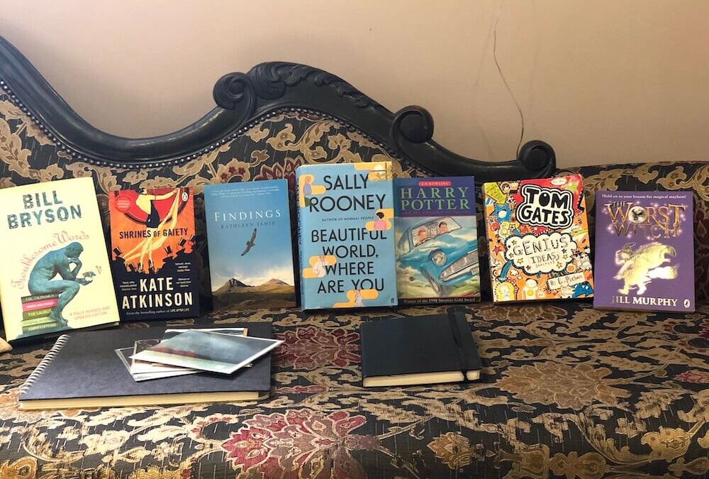 English teacher books for holiday - on couch
