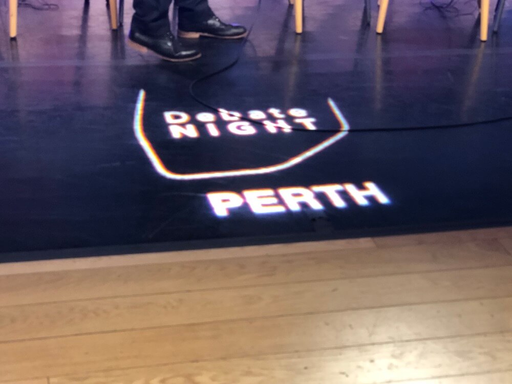 Debate night Perth studio floor symbol