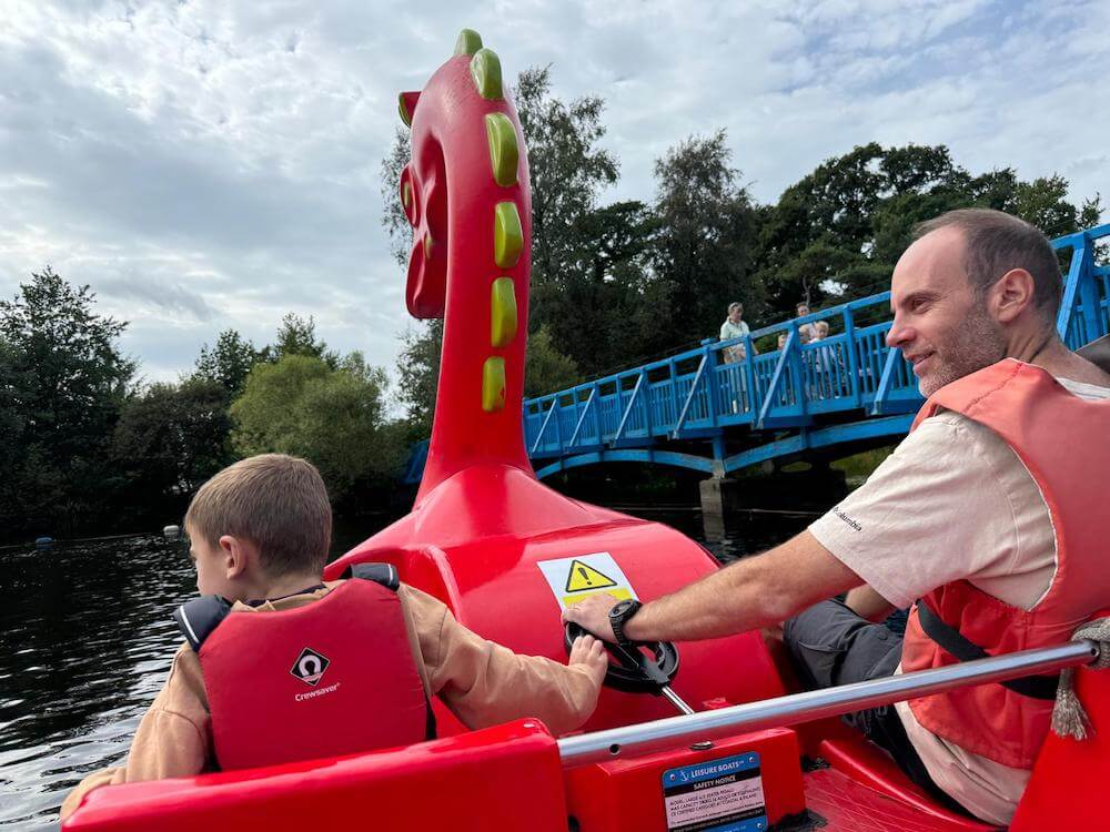 Father and son on the pedal boats at Blair Drummond Safari park