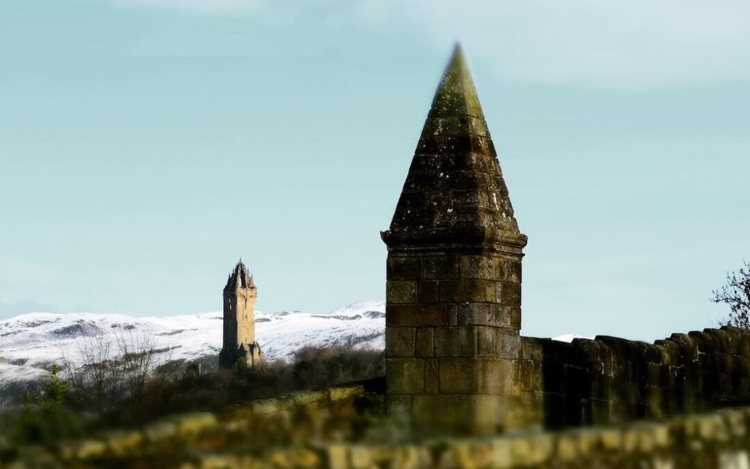 The Wallace Monument seen from Stirling Bridge, winter - with snow for slow travel Stilrling