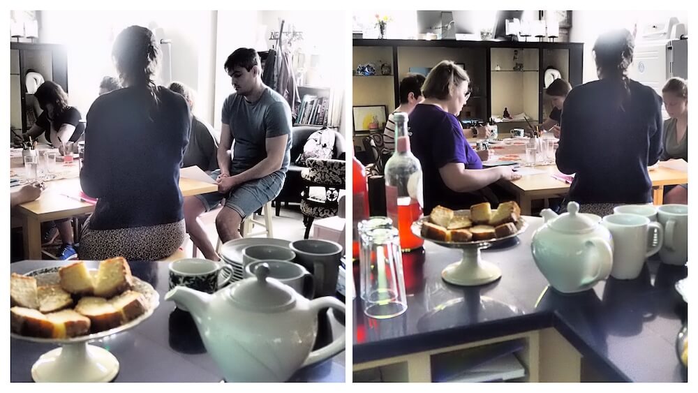 Non-native English speakers practising pronunciation together around a table