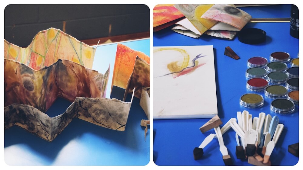 Artist Liz Kemp demonstrating art techniques during a creative workshop in Perthshire.