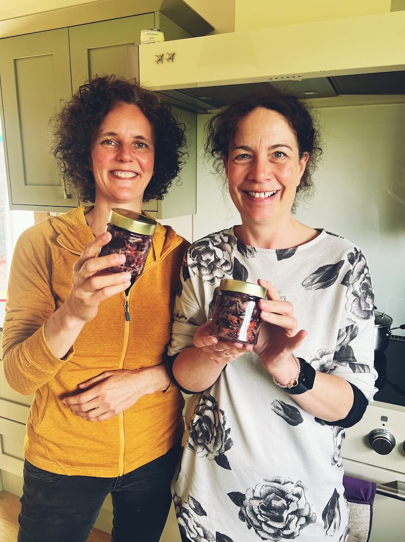 Ruth Pringle and language guest with first jars of sauerkraut