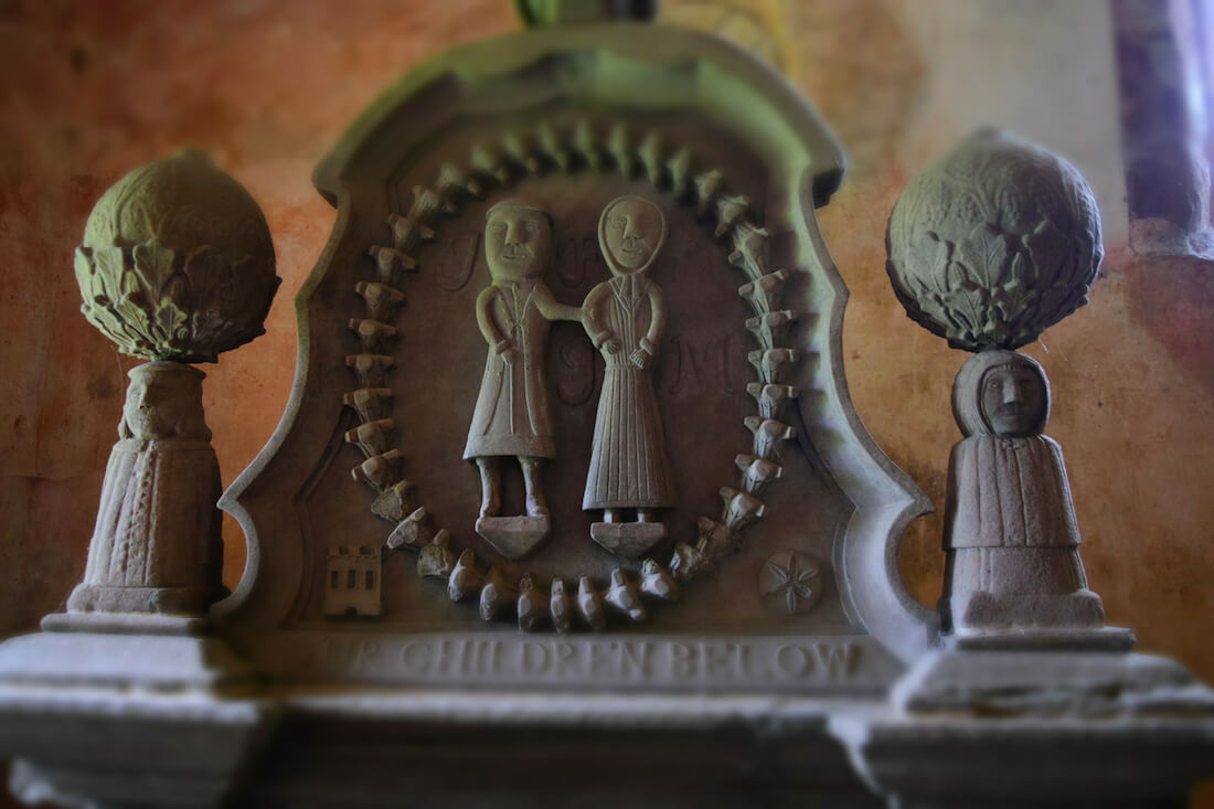 couple on memorial sculpture at Innerpreffray chapel